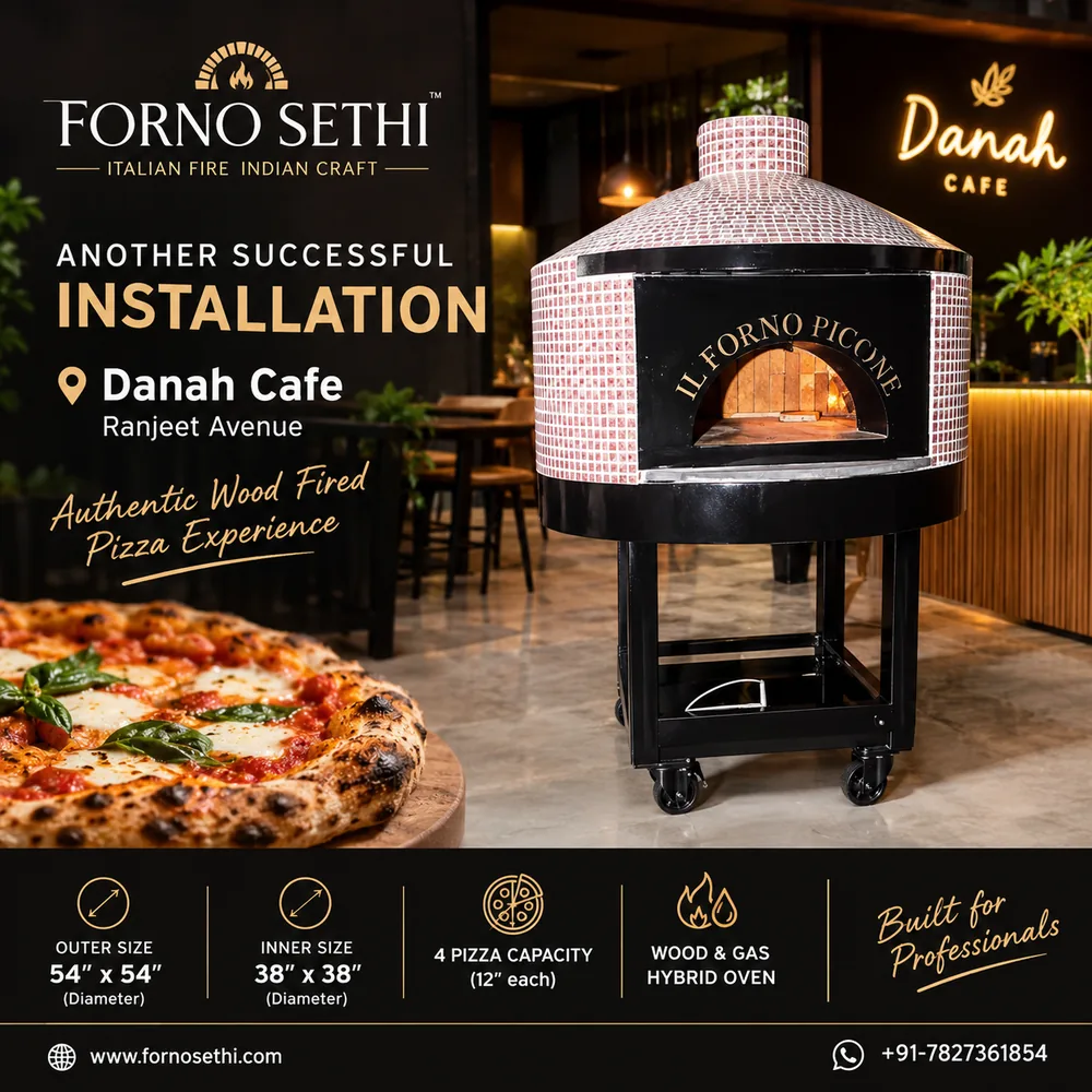 Forno Sethi 54 inch wood and gas hybrid movable brick pizza oven installed at Danah Cafe, Ranjit Avenue, Amritsar